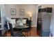Cozy living space with modern stainless fridge and table area at 4212 Logan Dr, Loganville, GA 30052