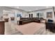 Open basement with a large sectional sofa, light wood-style flooring, and recessed lighting at 4850 Kentwood Dr, Marietta, GA 30068
