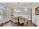 Formal dining room with a chandelier and natural light at 4850 Kentwood Dr, Marietta, GA 30068