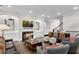 Spacious living room with a fireplace, built-in cabinets, and elegant seating, perfect for relaxing at 4850 Kentwood Dr, Marietta, GA 30068