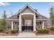 Mailboxes under a roofed structure with white pillars, located within a well-maintained community at 4850 Kentwood Dr, Marietta, GA 30068