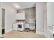 Mud room featuring a dog wash station, laundry appliances, tiled flooring and ample counter and cabinet space at 4850 Kentwood Dr, Marietta, GA 30068