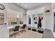 The mud room features a large window, a built-in desk with monitors, and coat and shoe storage cubbies at 4850 Kentwood Dr, Marietta, GA 30068