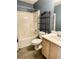 Bathroom featuring shower-tub combination and a single sink vanity at 2199 Ramblewood Cir, Decatur, GA 30035