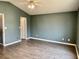 Bedroom with neutral walls, gray flooring and ceiling fan at 2199 Ramblewood Cir, Decatur, GA 30035