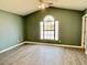 Spacious bedroom featuring stylish, gray flooring and a large window for natural light at 2199 Ramblewood Cir, Decatur, GA 30035
