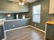Dining area with wood floors and connection to the kitchen at 2199 Ramblewood Cir, Decatur, GA 30035