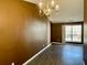 Dining room showcasing a chandelier, neutral walls, and modern flooring at 2199 Ramblewood Cir, Decatur, GA 30035