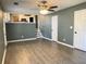 Open-concept living room features wood floors and access to the kitchen at 2199 Ramblewood Cir, Decatur, GA 30035