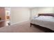 Comfortable bedroom featuring plush carpeting with a doorway view to the bathroom at 2283 Shady Maple Ln, Loganville, GA 30052