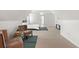 Neutral bedroom featuring sitting area, neutral carpet, and a ceiling fan at 2283 Shady Maple Ln, Loganville, GA 30052