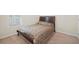 Cozy bedroom with natural light and comfortable bedding at 2283 Shady Maple Ln, Loganville, GA 30052