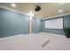 Home theater with mounted projector, a large screen, and premium surround sound at 2283 Shady Maple Ln, Loganville, GA 30052