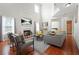Bright living room boasts high ceilings, fireplace, and modern furnishings at 2283 Shady Maple Ln, Loganville, GA 30052