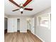 Bright bedroom featuring a ceiling fan, neutral walls, and a view to the bathroom at 4281 Welbron Dr, Decatur, GA 30035
