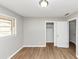 Bedroom with hardwood flooring, large closet, natural light, and neutral paint at 4281 Welbron Dr, Decatur, GA 30035