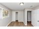 Bedroom featuring wood floors, natural light, closet, and neutral paint at 4281 Welbron Dr, Decatur, GA 30035