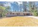 Charming single-story home with a well-maintained front yard and attached carport at 4281 Welbron Dr, Decatur, GA 30035