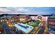 Aerial view of outdoor shopping center with restaurants, theater, shops and beautiful streetscape at 706 S Grand Nw Ave, Atlanta, GA 30318