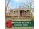 Charming single-story home with a covered front porch at 706 S Grand Nw Ave, Atlanta, GA 30318