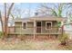 Charming bungalow with a covered front porch and neutral exterior at 706 S Grand Nw Ave, Atlanta, GA 30318