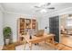 Open-concept kitchen with stainless steel refrigerator and storage at 706 S Grand Nw Ave, Atlanta, GA 30318