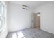 Bright bedroom with soft carpet, mini split AC, and a window that fills the room with natural light at 813 Smith Sw St # B, Atlanta, GA 30310