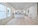 Bright kitchen with granite countertops, white cabinets, and stainless steel appliances at 813 Smith Sw St # B, Atlanta, GA 30310