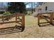 Fenced backyard with mature trees and a view of the house at 2184 E Cherokee Dr, Woodstock, GA 30188