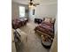 Comfortable bedroom with two twin beds and matching quilts plus ceiling fan at 2184 E Cherokee Dr, Woodstock, GA 30188