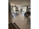 Open-concept dining area adjacent to the kitchen, featuring modern furnishings and abundant natural light at 2184 E Cherokee Dr, Woodstock, GA 30188