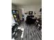 Functional home office featuring a dedicated workspace, ample storage, and stylish, patterned wallpaper at 2184 E Cherokee Dr, Woodstock, GA 30188
