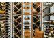 Custom wine room with temperature-controlled wine racks at 2500 Brook Run, Alpharetta, GA 30009