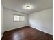 Bedroom with hardwood floors, neutral walls and natural lighting at 2717 Rosemont Dr, Lawrenceville, GA 30044