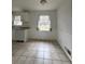 Kitchen nook includes tile flooring, breakfast area and natural light at 2717 Rosemont Dr, Lawrenceville, GA 30044