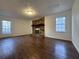 The living room features a brick fireplace and a glass door at 2717 Rosemont Dr, Lawrenceville, GA 30044