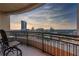 Serene balcony view showcasing breathtaking city skyline and sunset at 3445 Stratford Ne Rd # 502, Atlanta, GA 30326