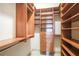 Spacious walk-in closet with custom shelving and storage solutions at 3445 Stratford Ne Rd # 502, Atlanta, GA 30326