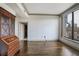 Spacious living room with large window and hardwood floors has plenty of natural light at 3445 Stratford Ne Rd # 502, Atlanta, GA 30326