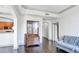 Inviting living room featuring hardwood floors with views into the kitchen and doorway at 3445 Stratford Ne Rd # 502, Atlanta, GA 30326