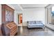 Inviting living room featuring hardwood floors and a classic writing desk at 3445 Stratford Ne Rd # 502, Atlanta, GA 30326