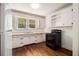 Cozy kitchen with lots of cabinet space and a view of the trees outside the window at 3542 W Hill St, Clarkston, GA 30021