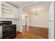 Eat in kitchen features hardwood floors and an oven and is open to other rooms at 3542 W Hill St, Clarkston, GA 30021