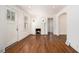 Bright living room with hardwood floors, fireplace, and natural light at 3542 W Hill St, Clarkston, GA 30021