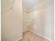 Walk-in closet with shelving for optimal storage at 1296 Park Pass Way, Suwanee, GA 30024