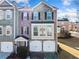 Charming two-story brick townhouse with two-car garage and well-manicured landscaping in a desirable community at 1296 Park Pass Way, Suwanee, GA 30024