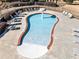 Aerial view of a community splash pool with lounge chairs and landscaping at 1296 Park Pass Way, Suwanee, GA 30024