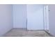Unfinished basement with concrete floors and an open doorway at 247 Brookview Dr, Riverdale, GA 30274
