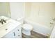 Updated bathroom featuring new vanity and tub and shower at 247 Brookview Dr, Riverdale, GA 30274