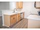 Bright kitchen features stainless steel appliances, white countertops and modern fixtures at 247 Brookview Dr, Riverdale, GA 30274